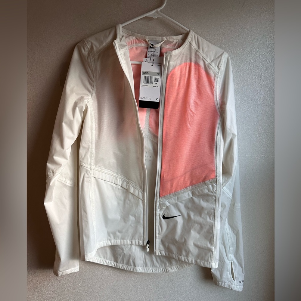 Nike running jacket with removable down pads XS includes whistle